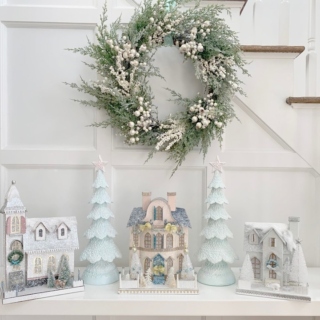 Decorate your home with our charming village houses! Our festive collection features a cozy white cottage, a snowy white church, and a pink fancy champagne manor. Create your own merry little village! Wreath and trees also available on the website!  Link in bio